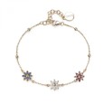 Bracciale morbido in argento 925‰, placcatura oro giallo, 24 cubic zirconia bianchi, rodolite, blu
